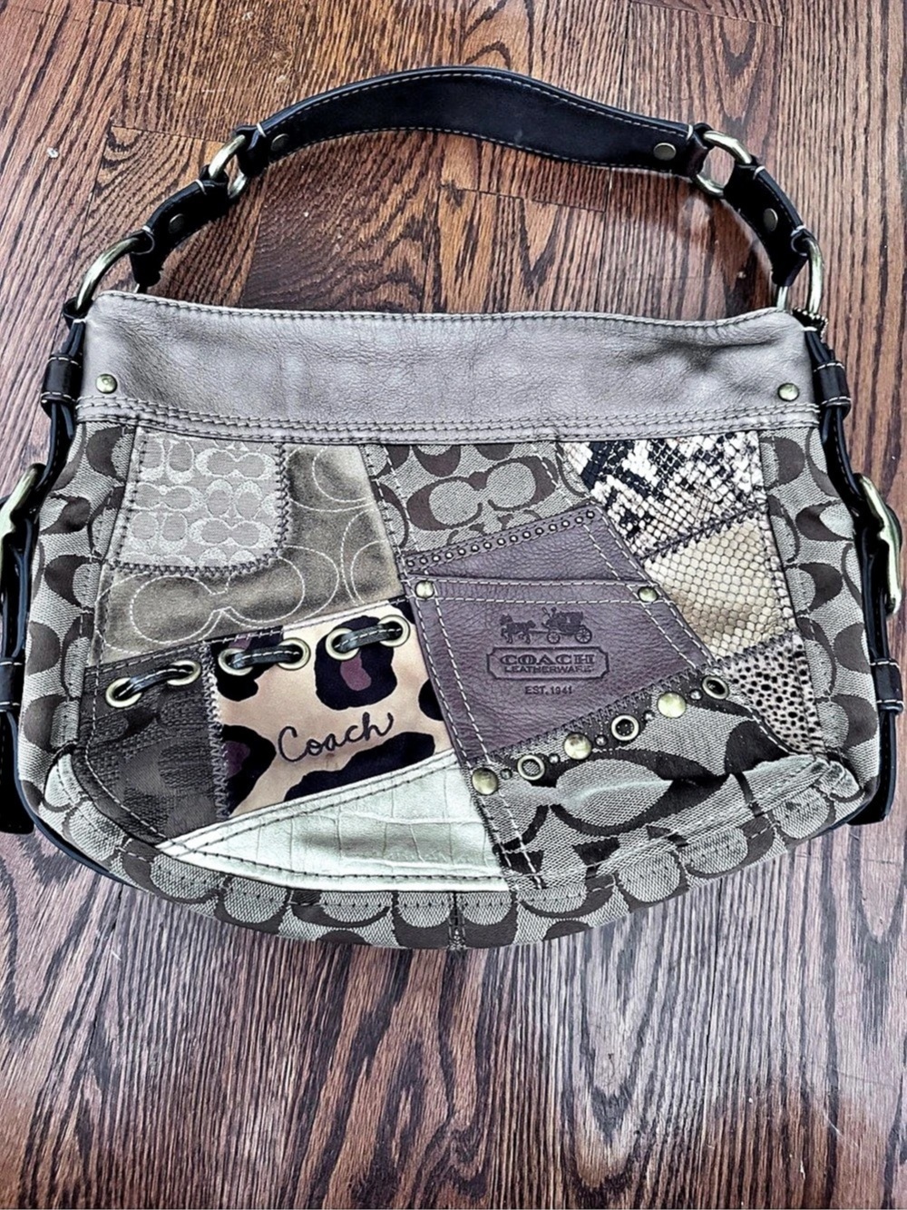 Vintage Y2K Coach zoePatchwork
Hobo Bag F23873.- Mixed Leather Animal
Print